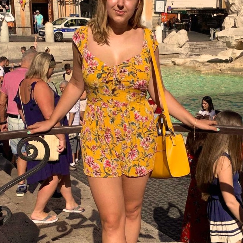 Open back yellow floral romper